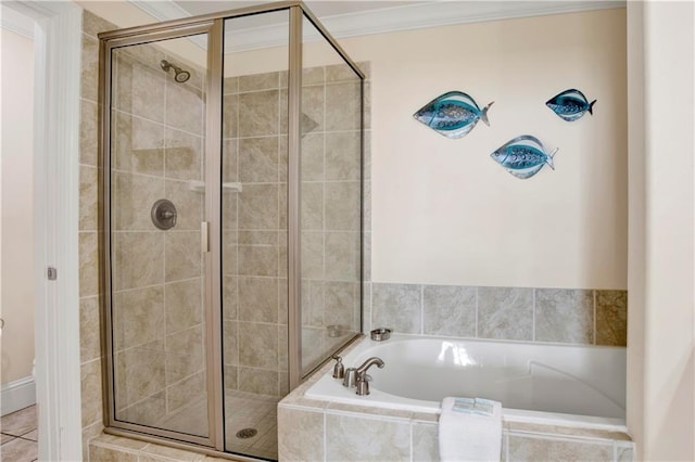 bathroom featuring crown molding and shower with separate bathtub