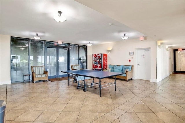 rec room with light tile patterned floors