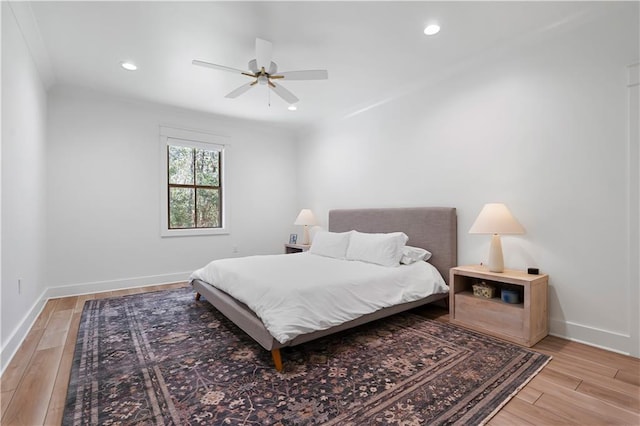 325 Pecan Ridge Blvd, Fairhope, AL 36532 - bedroom with light wood-style flooring, baseboards, and recessed lighting