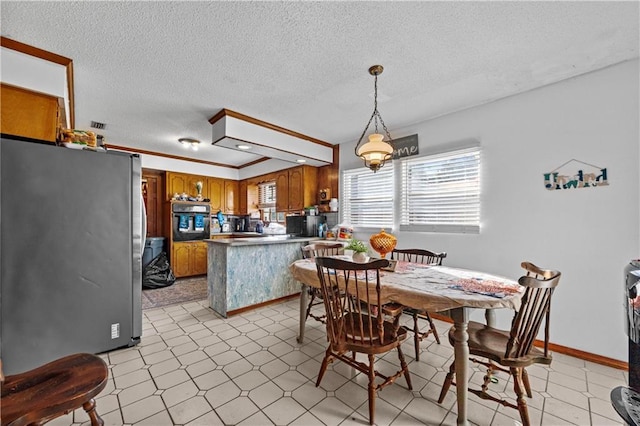 dining area with a textured ceiling