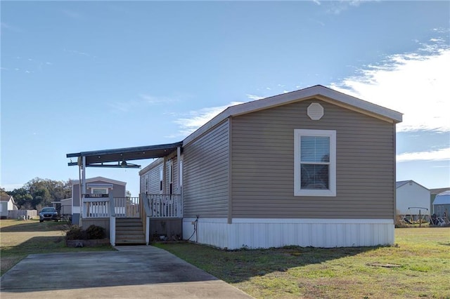 view of home's exterior featuring a yard