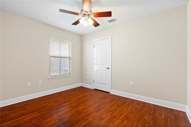 unfurnished room featuring ceiling fan and wood-type flooring