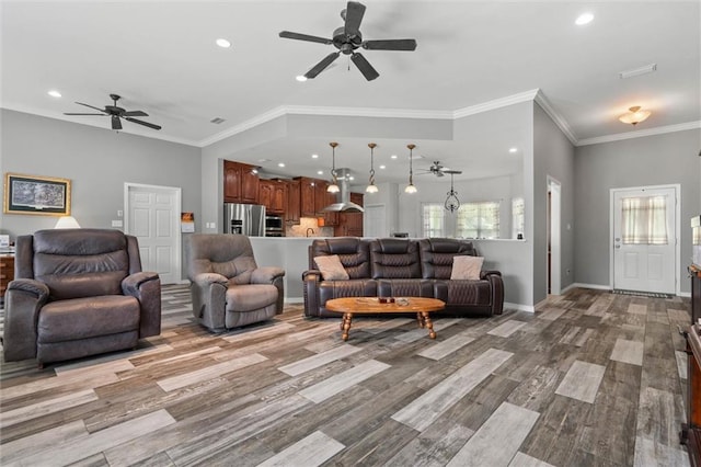 218 Ferry Ave, Saraland, AL 36571 - living area featuring ceiling fan, recessed lighting, wood finished floors, crown molding, and baseboards