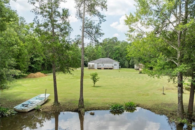 218 Ferry Ave, Saraland, AL 36571 - view of green lawn with a water view