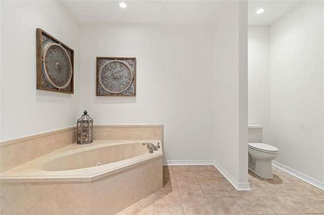 218 Ferry Ave, Saraland, AL 36571 - full bath with a whirlpool tub, toilet, recessed lighting, and tile patterned floors