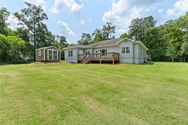 218 Ferry Ave, Saraland, AL 36571 - rear view of property featuring a wooden deck and a lawn