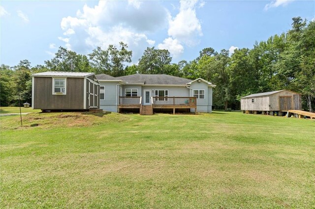 218 Ferry Ave, Saraland, AL 36571 - back of house featuring a wooden deck, a yard, and view of scattered trees