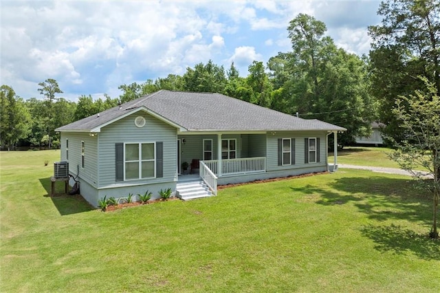 218 Ferry Ave, Saraland, AL 36571 - view of front of house with a porch, a front lawn, and central AC unit