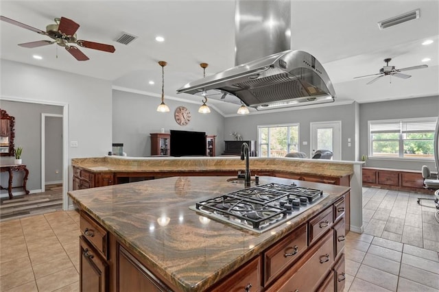 218 Ferry Ave, Saraland, AL 36571 - kitchen with stainless steel gas stovetop, a ceiling fan, healthy amount of natural light, recessed lighting, and ornamental molding