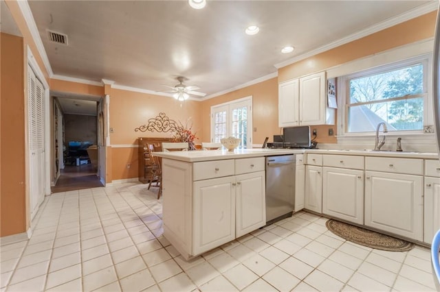 kitchen featuring kitchen peninsula, dishwasher, crown molding, white cabinets, and sink