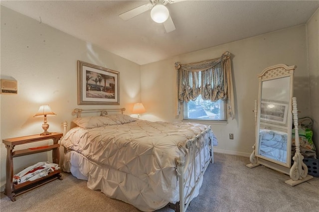 bedroom featuring ceiling fan and carpet flooring