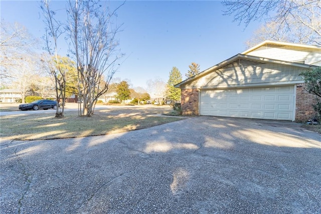 view of property exterior featuring a garage