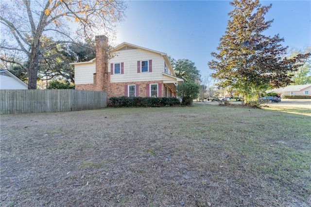 view of front of house with a front lawn