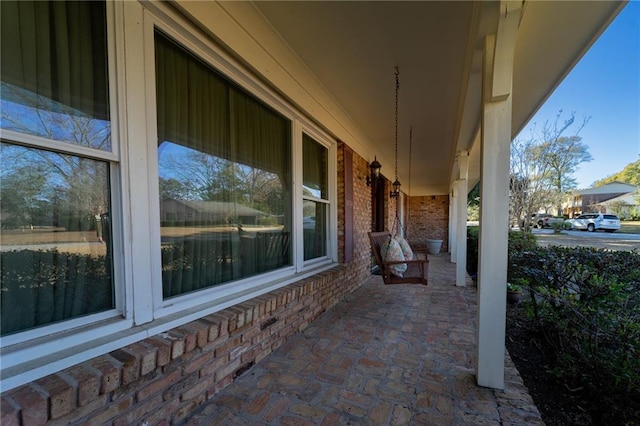 view of patio featuring a porch