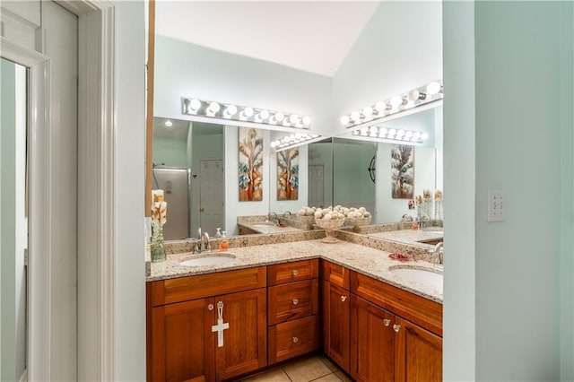 10164 Waterford Way, Mobile, AL 36695 - full bathroom with double vanity, tile patterned flooring, an enclosed shower, and lofted ceiling