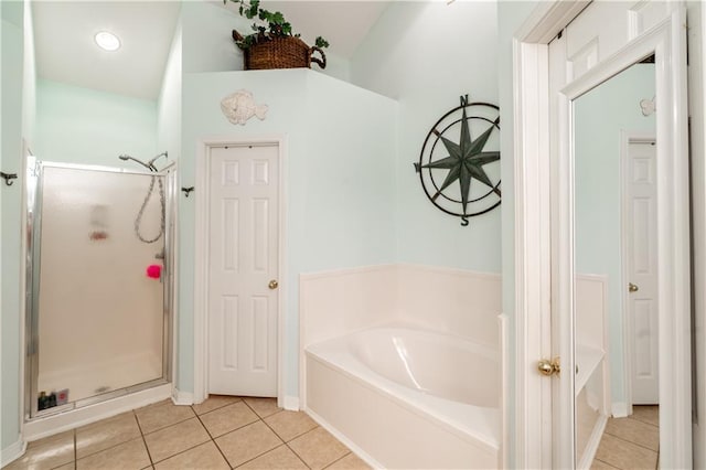 10164 Waterford Way, Mobile, AL 36695 - bathroom featuring a bath, tile patterned floors, and a stall shower
