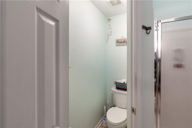 10164 Waterford Way, Mobile, AL 36695 - bathroom featuring a shower stall and toilet