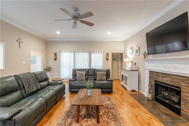 10164 Waterford Way, Mobile, AL 36695 - living room with ornamental molding, a ceiling fan, wood finished floors, a fireplace, and recessed lighting