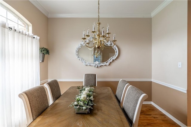 10164 Waterford Way, Mobile, AL 36695 - dining space featuring a chandelier, crown molding, and wood finished floors