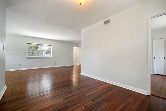 2852 Exter Dr, Mobile, AL 36606 - spare room featuring dark wood-style floors and baseboards