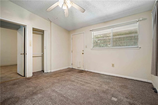 2852 Exter Dr, Mobile, AL 36606 - unfurnished bedroom featuring carpet, a textured ceiling, ceiling fan, and a closet