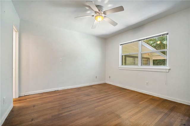 2852 Exter Dr, Mobile, AL 36606 - unfurnished room with wood finished floors, baseboards, and ceiling fan