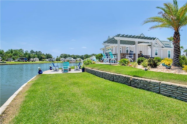 view of yard featuring a pergola, a patio area, and a water view