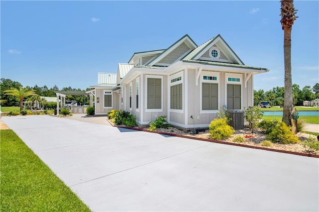 view of front of property featuring central air condition unit