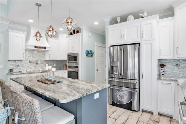 kitchen featuring white cabinetry and stainless steel appliances