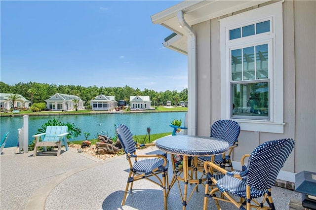 view of patio featuring a water view