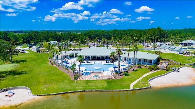 birds eye view of property with a water view