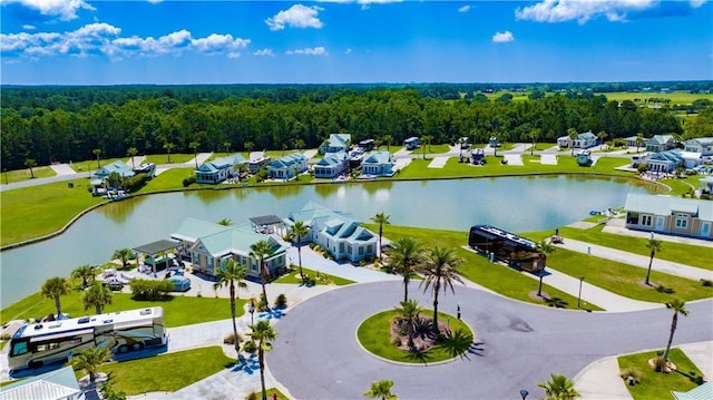 bird's eye view with a water view