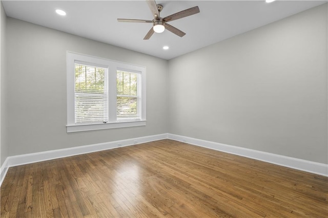 2203 Dauphin St, Mobile, AL 36606 - empty room with a ceiling fan, baseboards, wood finished floors, and recessed lighting