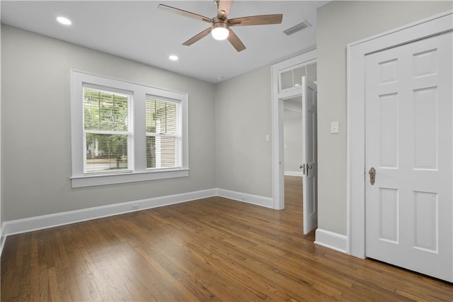 2203 Dauphin St, Mobile, AL 36606 - spare room featuring ceiling fan, wood finished floors, baseboards, and recessed lighting