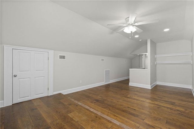 2203 Dauphin St, Mobile, AL 36606 - additional living space with ceiling fan, vaulted ceiling, dark wood finished floors, and baseboards