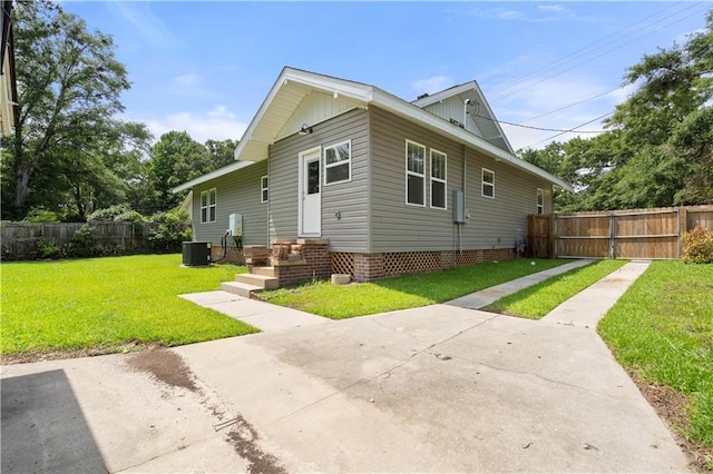 2203 Dauphin St, Mobile, AL 36606 - rear view of house featuring central AC unit