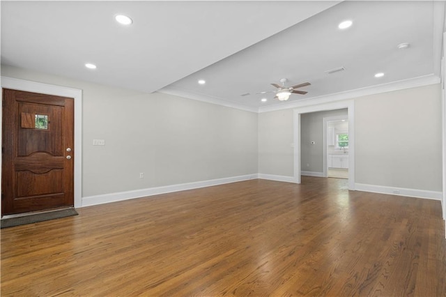 2203 Dauphin St, Mobile, AL 36606 - empty room with crown molding, baseboards, ceiling fan, wood finished floors, and recessed lighting