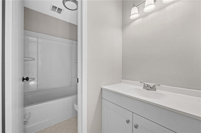 full bathroom with vanity, toilet, and shower / bathtub combination