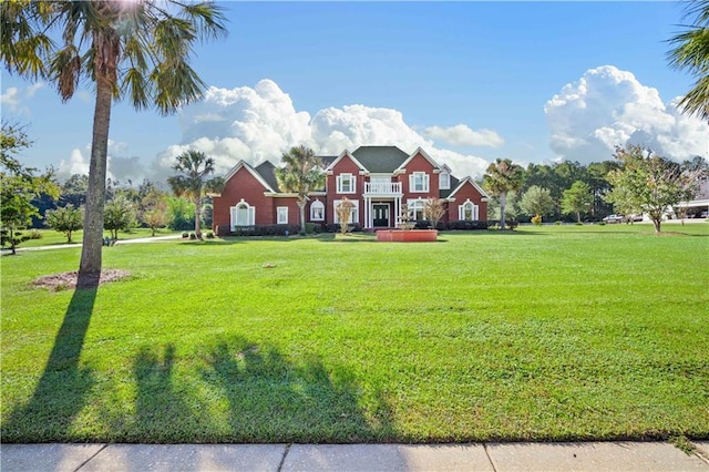 view of front of property with a front lawn