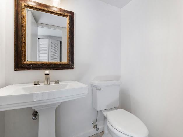 bathroom with a sink and toilet