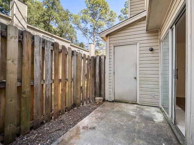 view of patio with fence