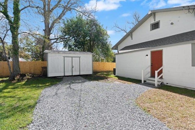 1012 Texas St, Mobile, AL 36604 - exterior space featuring an outdoor structure, a storage shed, fence, and entry steps
