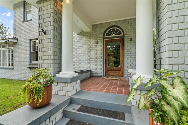 264 Mcdonald Ave, Mobile, AL 36604 - property entrance featuring covered porch and brick siding