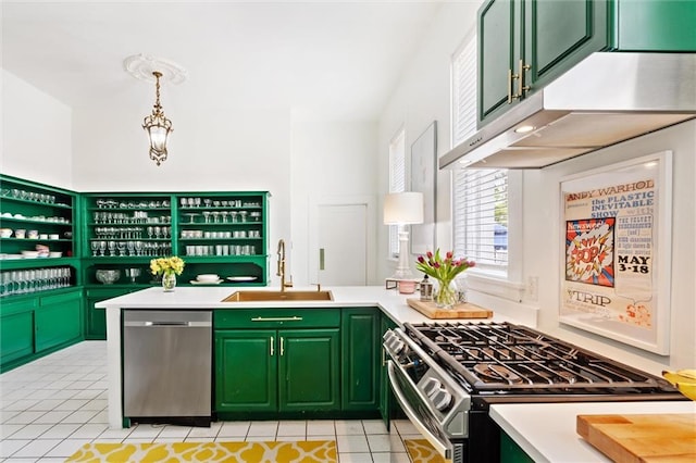 kitchen featuring range with two ovens, stainless steel dishwasher, green cabinetry, sink, and light tile floors