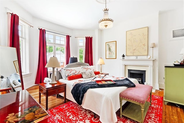 bedroom featuring dark hardwood / wood-style flooring