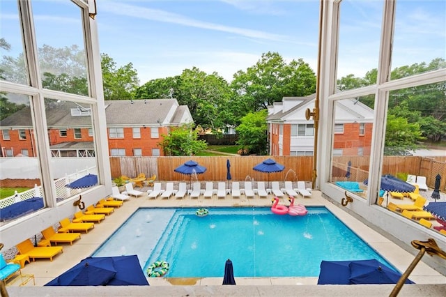 view of pool featuring a patio