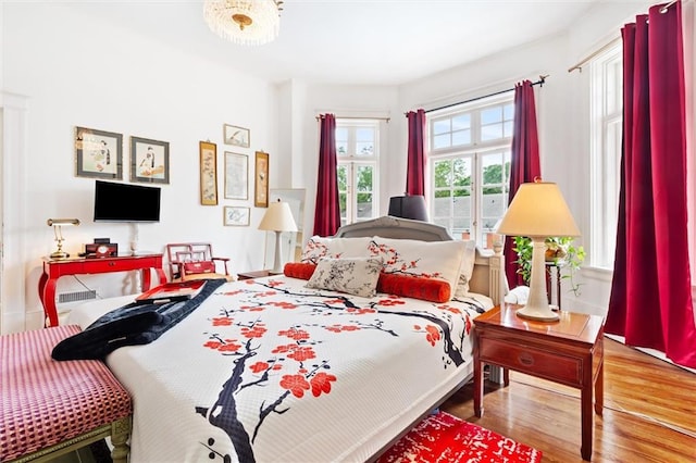 bedroom featuring wood-type flooring