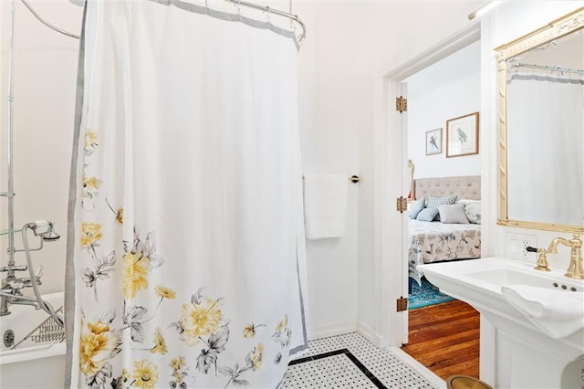 bathroom featuring tile floors