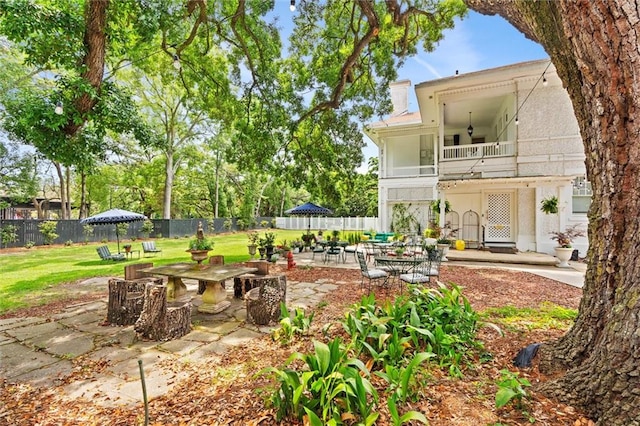 exterior space featuring a patio area and a balcony