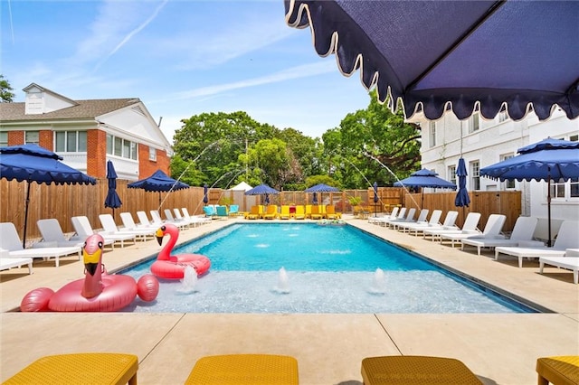 view of pool featuring a patio area and pool water feature